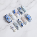 Hero flat lay blue floral press-on nails