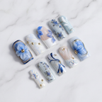 Hero flat lay blue floral press-on nails
