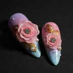 Macro close-up 3D sculpted rose peony rhinestone gold filigree custom press-on nails pink purple dramatic lighting — LuxepressCo