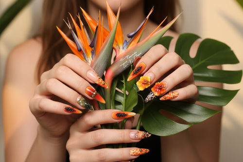 Light skin hands holding tropical orange bird of paradise flowers wearing tropical hibiscus custom press-on nails — LuxepressCo