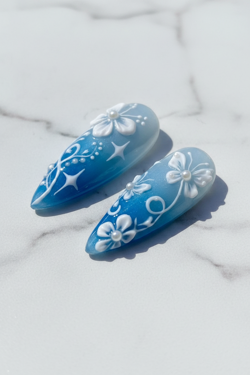 Close-up blue ombre swirl vine sparkle star texture gloss custom press-on nails white marble — LuxepressCo