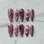 Flat lay top-down full set salon-quality purple celestial press-on nails white marble — LuxepressCo
