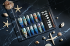 Luxury dark navy unboxing deep ocean blue glitter jelly starfish pearl stiletto custom press-on nails with accessories — LuxepressCo