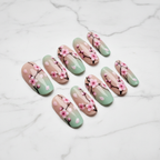 Full set 10 cherry blossom 3D sakura custom press-on nails on marble background studio hero shot — LuxepressCo