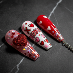 Valentine's Day XOXO hearts glitter close-up custom press-on nails red pink dramatic — LuxepressCo