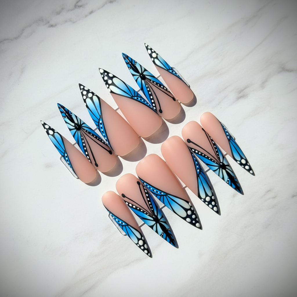 Blue morpho butterfly wing cobalt ombre black vein white dot custom press-on nails stiletto full set on marble — LuxepressCo
