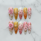 Flat lay top-down full set 10 pink gold 3D floral pearl rhinestone almond custom press-on nails — LuxepressCo