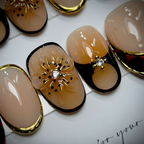 Macro close-up tortoiseshell nude gold French tip 3D snowflake charm diamond rhinestone salon-quality nails detail — LuxepressCo
