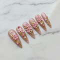 Full set 10 3D pink floral gold vine stiletto custom press-on nails on marble background — LuxepressCo