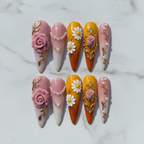Flat lay top-down full set 10 3D rose daisy gold frame reusable salon-quality nails white marble — LuxepressCo