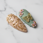 Macro close-up cream gold filigree vine sage green floral 3D custom press-on nails marble — LuxepressCo