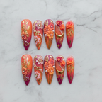 Flat lay top-down full set 10 reusable nails 3D floral orange pink ombre marble background — LuxepressCo