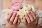 Light skin hands holding pink peonies white ranunculus wearing aurora bloom custom press-on nails blush pink — LuxepressCo