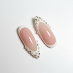Macro close-up nude blush white French tip micro pearl crystal rhinestone scalloped border salon-quality almond press-on nails — LuxepressCo