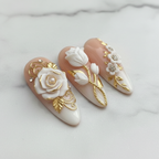 Macro close-up 3D white tulip floral gold vine custom press-on nails glossy texture marble — LuxepressCo