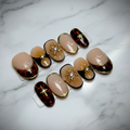 Full set tortoiseshell gold snowflake charm press-on nails on white marble studio light custom press-on nails — LuxepressCo