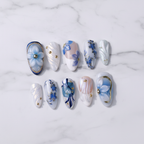 Blue floral almond press-on nails flat lay full set custom press-on nails — LuxepressCo