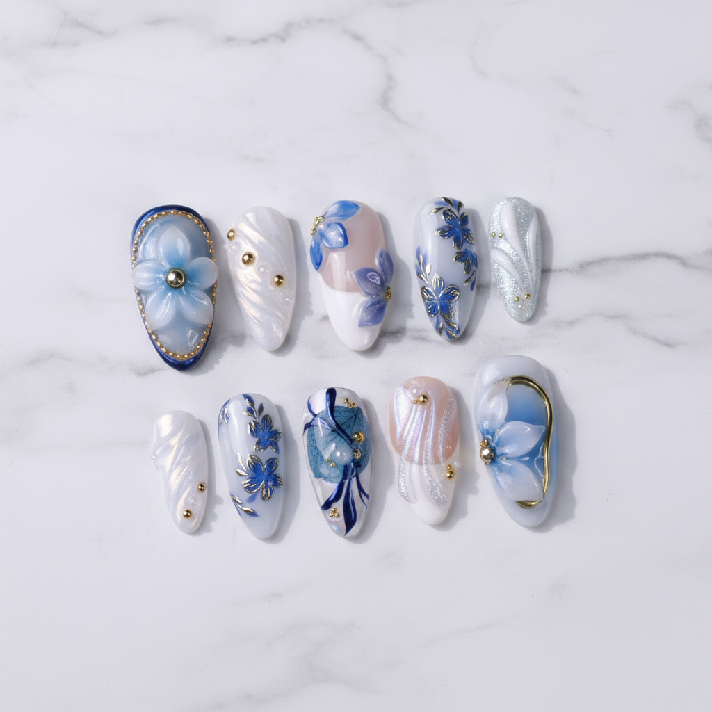 Blue floral almond press-on nails flat lay full set custom press-on nails — LuxepressCo