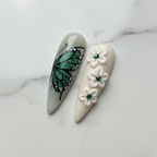 Macro emerald glitter butterfly rhinestone and 3D white flower gemstone custom press-on nails cream — LuxepressCo