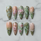 Flat lay top-down full set 10 floral 3D press-on nails sage green peach marble studio — LuxepressCo