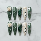 Flat lay overhead full set 10 sage green botanical press-on nails custom press-on nails studio — LuxepressCo