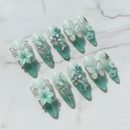 Full set 10 mint green 3D butterfly stiletto custom press-on nails on marble background — LuxepressCo