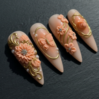Macro close-up 3D sculpted peach rose daisy gold filigree rhinestone custom press-on nails dark background — LuxepressCo
