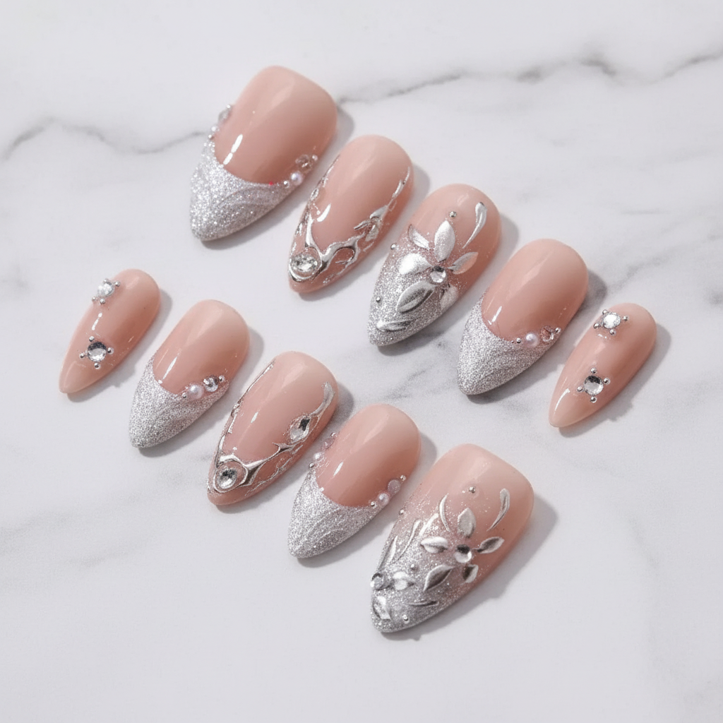 Silver chrome botanical vine leaf custom press-on nails nude bridal silver glitter French tip crystal full set flat lay — LuxepressCo