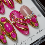 Macro close-up hot pink bubble gem gold chrome swirl AB crystal rhinestone custom press-on nails magenta — LuxepressCo