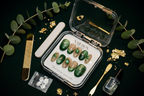 Luxury unboxing acrylic box emerald green scarab press-on nails with accessories on green velvet eucalyptus — LuxepressCo