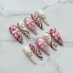 Pink leopard print stiletto press-on nails full set 10 pieces on marble background custom press-on nails — LuxepressCo