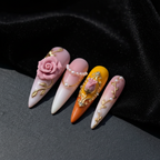 Close-up macro 3D pink rose pearl chain gold leaf blush pink custom press-on nails dramatic lighting — LuxepressCo