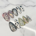 Aurora iridescent lotus butterfly chrome flame custom press-on nails teardrop full set on marble — LuxepressCo