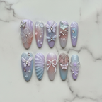 Hero studio shot full set 3D butterfly rhinestone custom press-on nails lavender purple marble background — LuxepressCo