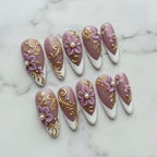 Mauve 3D flower gold baroque filigree French tip pearl press-on nails hero shot white marble studio custom press-on nails — LuxepressCo