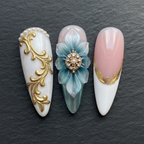 Macro close-up 3D blue flower rhinestone pearl gold baroque custom press-on nails dramatic lighting — LuxepressCo