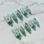Mint aurora 3D flower silver butterfly press-on nails hero shot white marble studio custom press-on nails — LuxepressCo