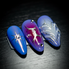 Macro close-up cobalt blue chrome foil 3D pearl rhinestone salon-quality nails nail art detail — LuxepressCo