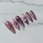 Full set 10 purple celestial floral custom press-on nails on white marble background — LuxepressCo
