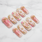 Full set 10 pink gold 3D bow butterfly floral custom press-on nails on marble background — LuxepressCo