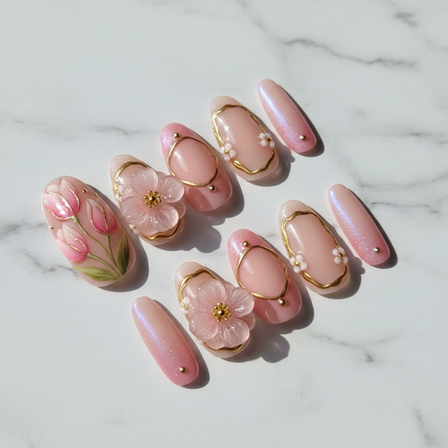 Pink blossom 3D translucent flower charm custom press-on nails soft nude aurora gold frame full set flat lay — LuxepressCo