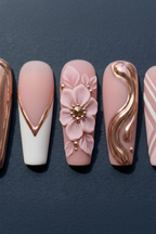 Macro close-up rose gold chrome mirror and 3D sculpted floral custom press-on nails dramatic lighting — LuxepressCo