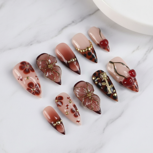 Dark leopard floral 3D gold flower stiletto custom press-on nails brown ombre full set flat lay — LuxepressCo