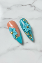 Macro close-up teal shimmer V-French gold filigree 3D flower press-on nails marble background — LuxepressCo