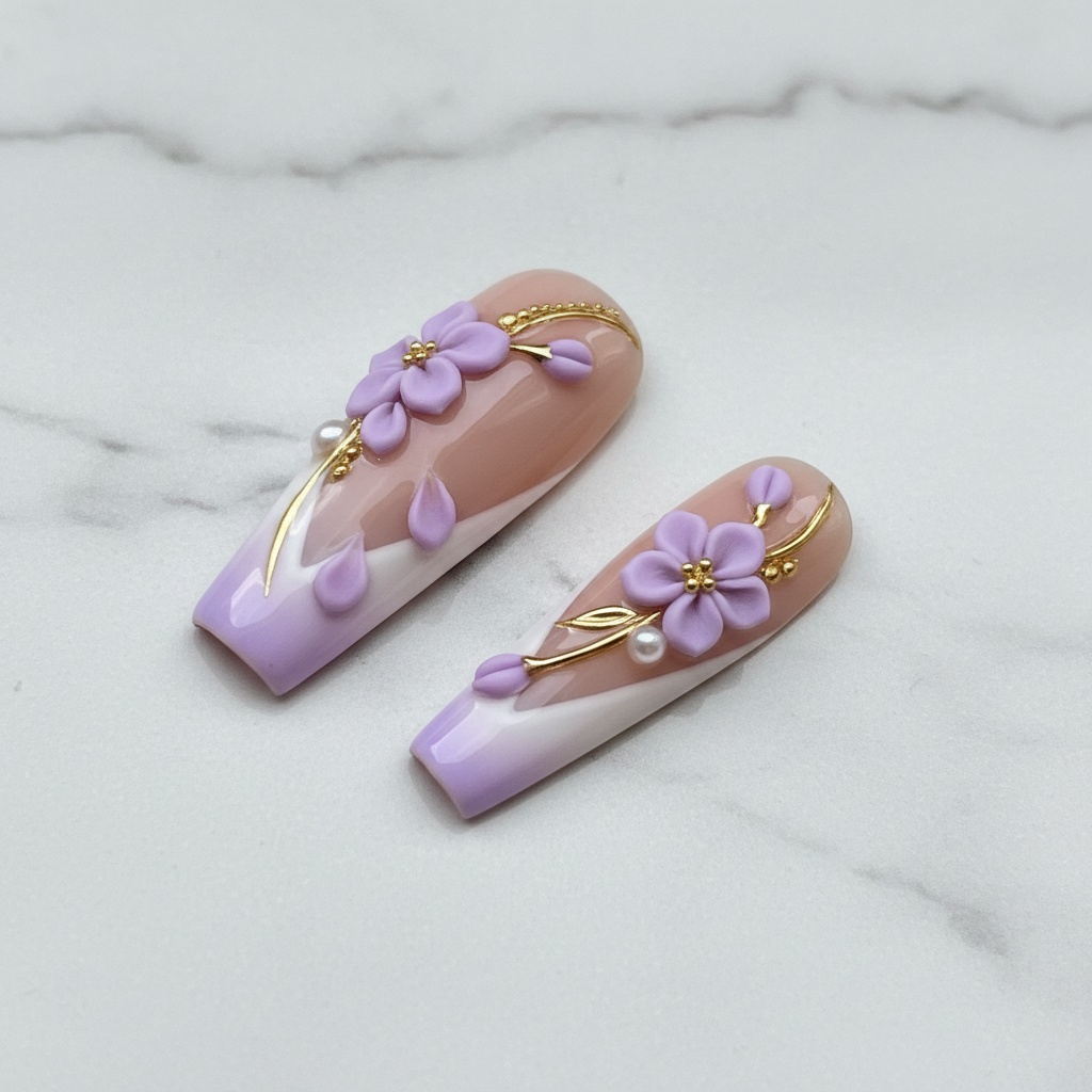 Close-up lavender French tip coffin press-on nails pearl and gold leaf texture detail on marble — LuxepressCo