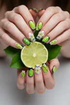 Fair skin hands wearing malachite noir square custom press-on nails holding fresh lime and green leaves — LuxepressCo