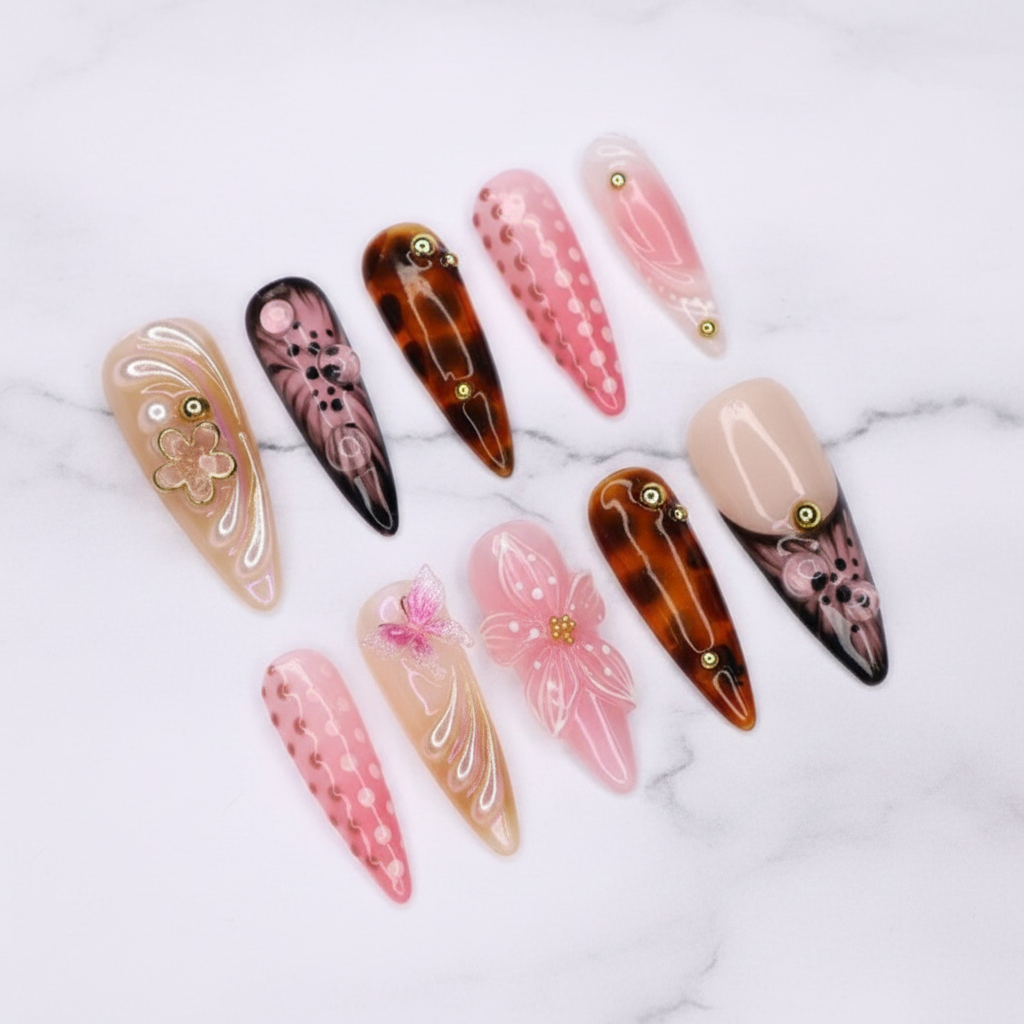 Full set 10 nude pink floral butterfly tortoiseshell almond stiletto custom press-on nails on marble — LuxepressCo