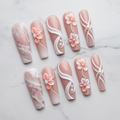Hero studio shot full set 10 luxury 3D pearl blossom marble custom press-on nails white background — LuxepressCo