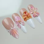 Macro close-up nude blush 3D pink orchid fan petal pearl salon-quality press-on nails — LuxepressCo