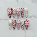 Flat lay top-down full set 10 pink leopard rhinestone bow reusable nails white marble — LuxepressCo
